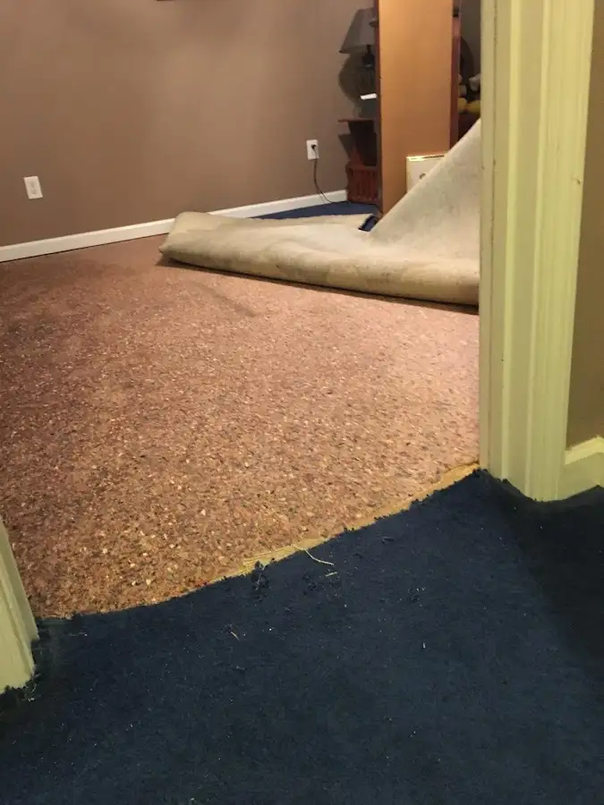 Carpet pad removal revealing water damage during Drying & Dehumidification in Benicia